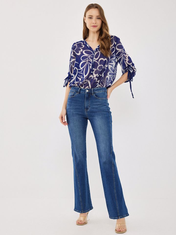 מכנסיים ג’ינס תיפור אורך FLARE בצבע ג’ינס