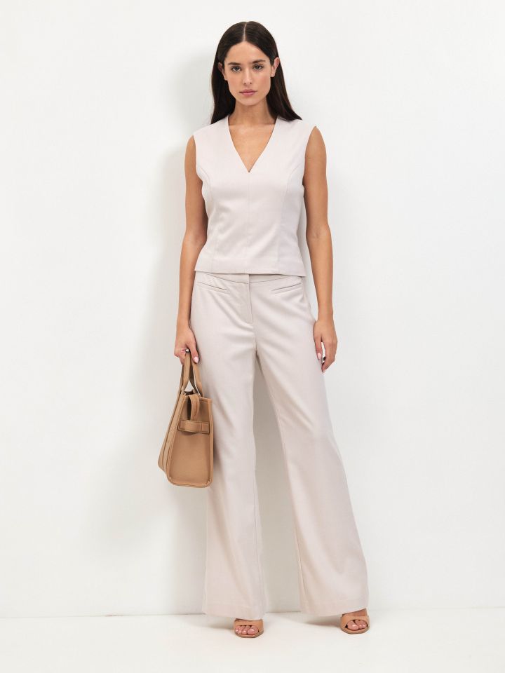 מכנסיים כיסי שפה LIA בצבע בייז’