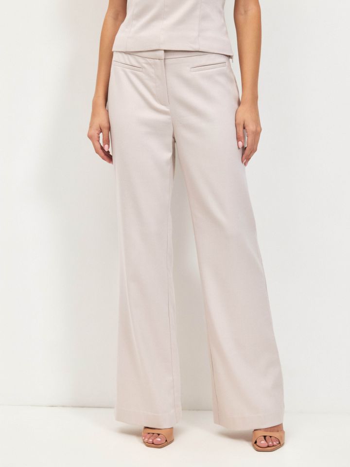 מכנסיים כיסי שפה LIA בצבע בייז’