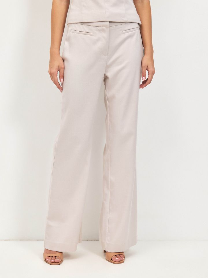 מכנסיים כיסי שפה LIA בצבע בייז’