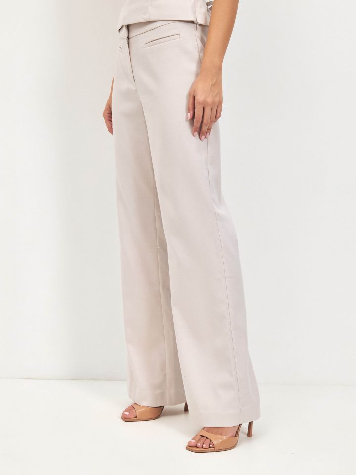 מכנסיים כיסי שפה LIA בצבע בייז’