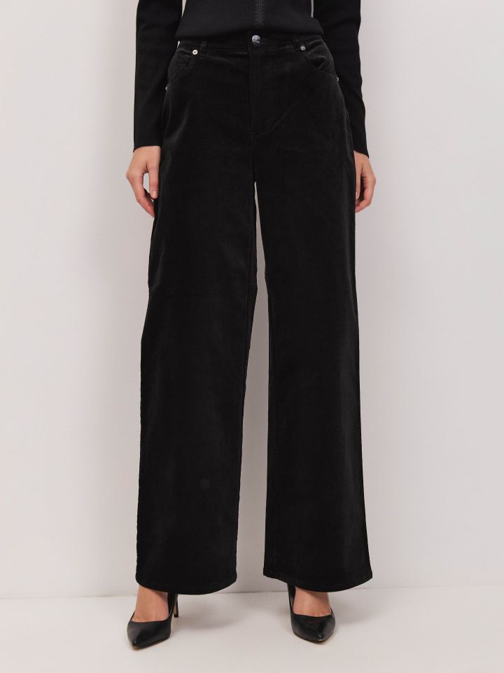 מכנסיים קטיפה מתרחב בצבע שחור