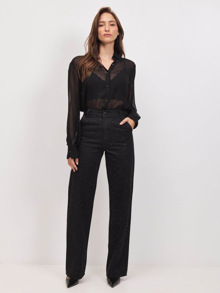 מכנסיים גינס שחור דמוי יהלומים בצבע ג’ינס שחור