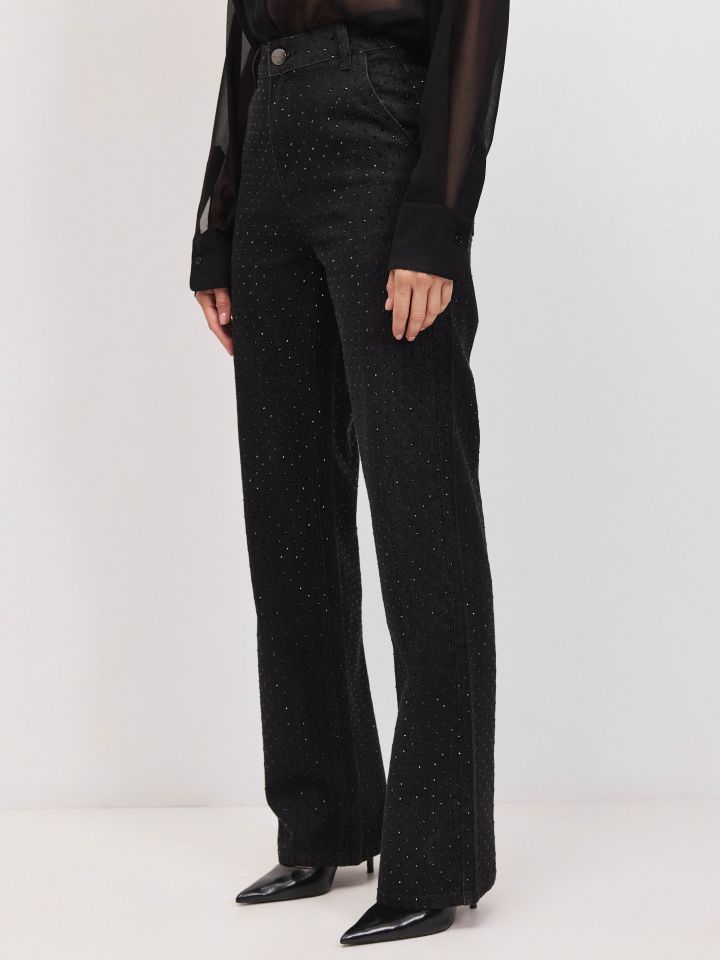 מכנסיים גינס שחור דמוי יהלומים בצבע ג’ינס שחור