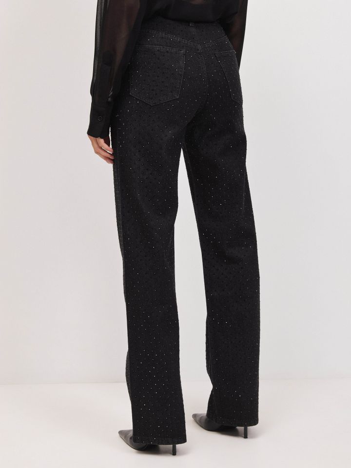 מכנסיים גינס שחור דמוי יהלומים בצבע ג’ינס שחור