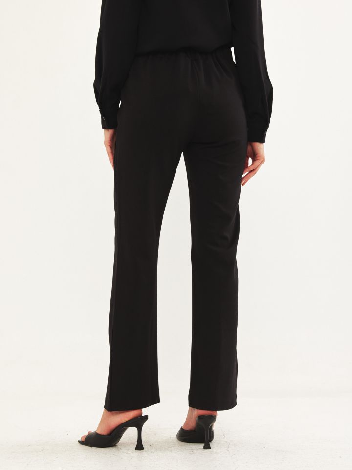 מכנסי כפתורי זהב בצבע שחור