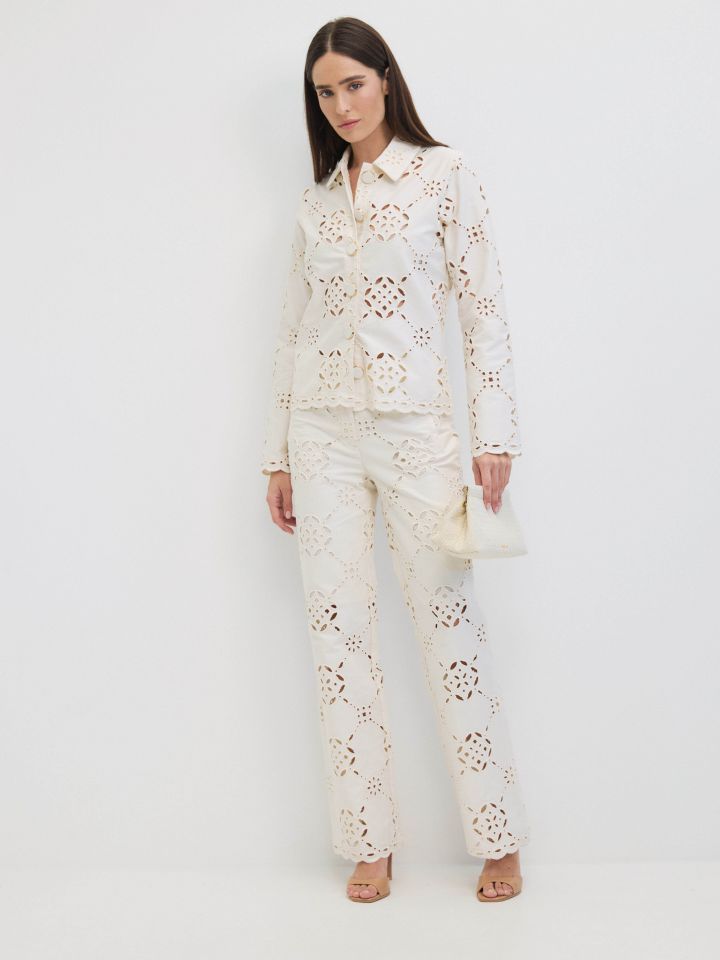 מכנסיים ריקמות בצבע אופוויט