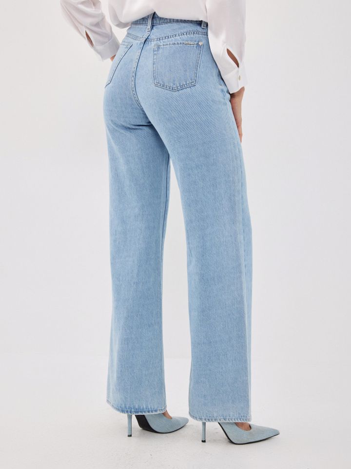 מכנסיים ג’ינס פדלפון בצבע ג’ינס בהיר