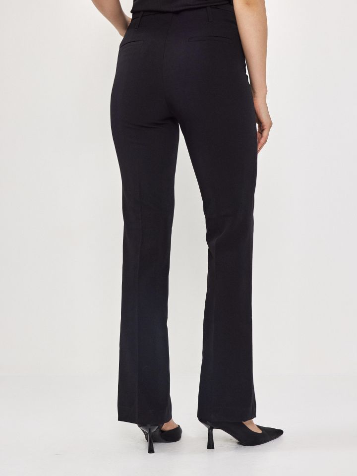 מכנסיים אבזם יהלומים בצבע שחור