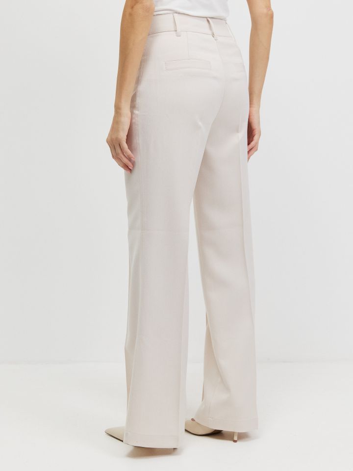 מכנסיים לולאה בחגורה SHIRA בצבע בייז’