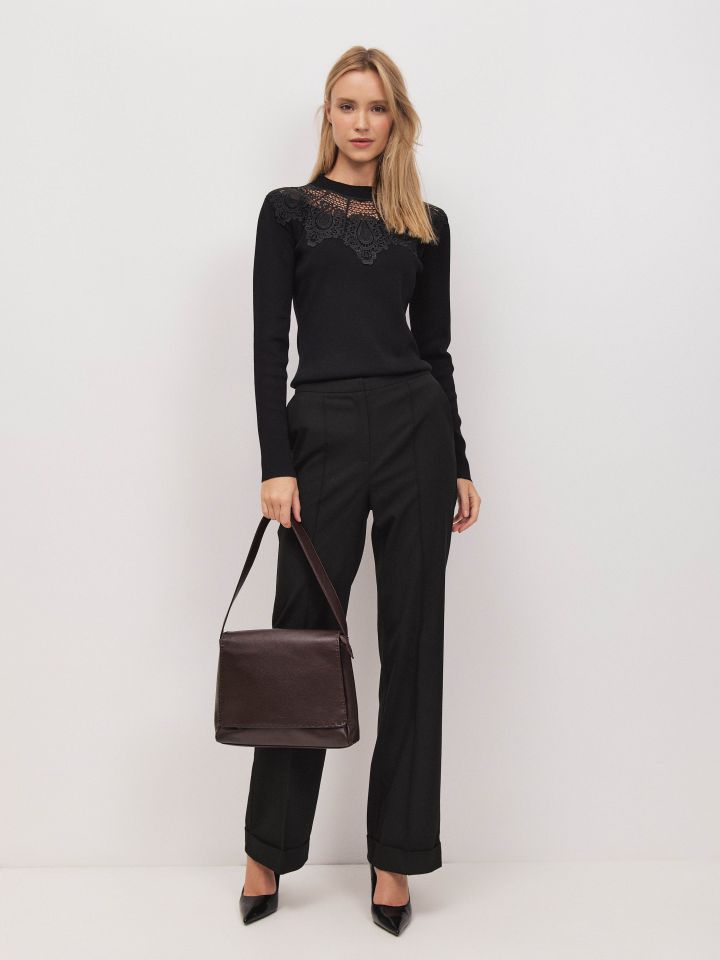 מכנסיים כיסי צד נירווירים בצבע שחור