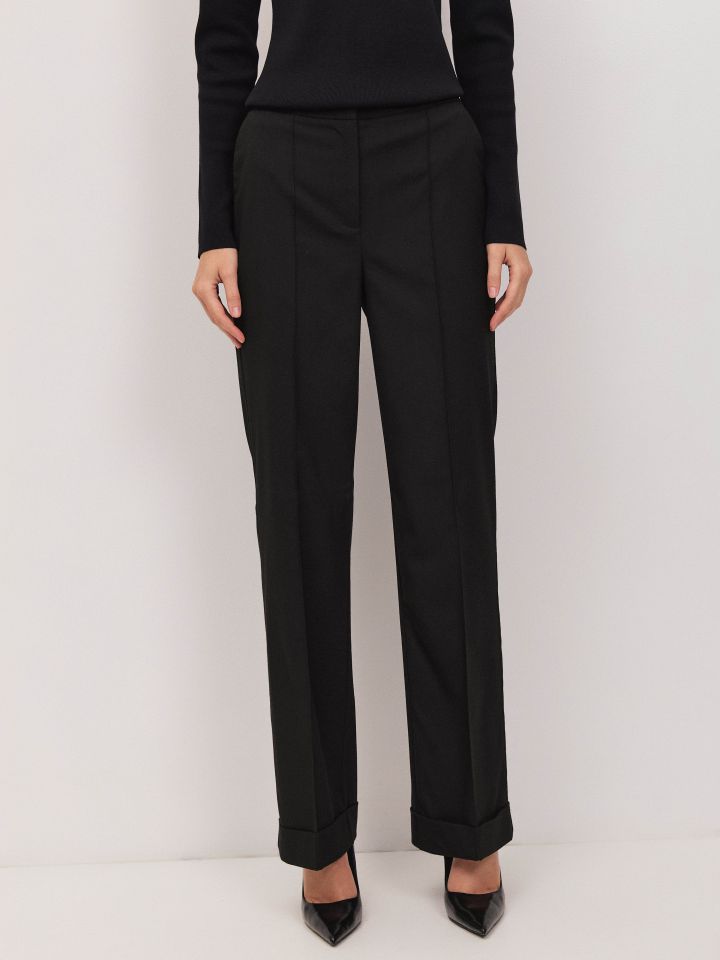 מכנסיים כיסי צד נירווירים בצבע שחור