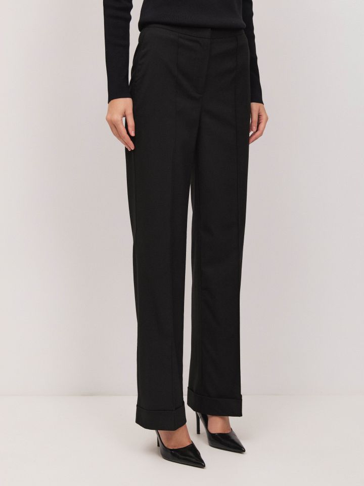 מכנסיים כיסי צד נירווירים בצבע שחור