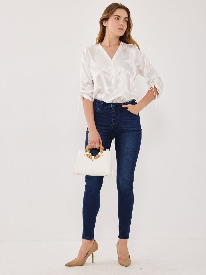 מכנסיים ג’ינס סקיני PROMO בצבע ג’ינס