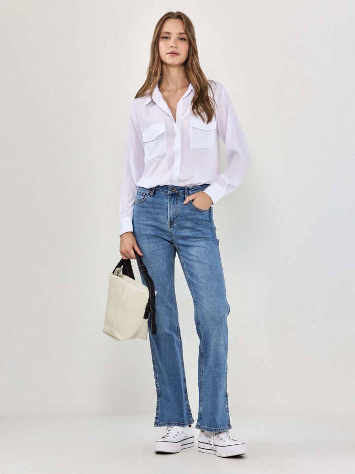 מכנסיים ג’ינס שליץ צד PROMO בצבע ג’ינס בהיר