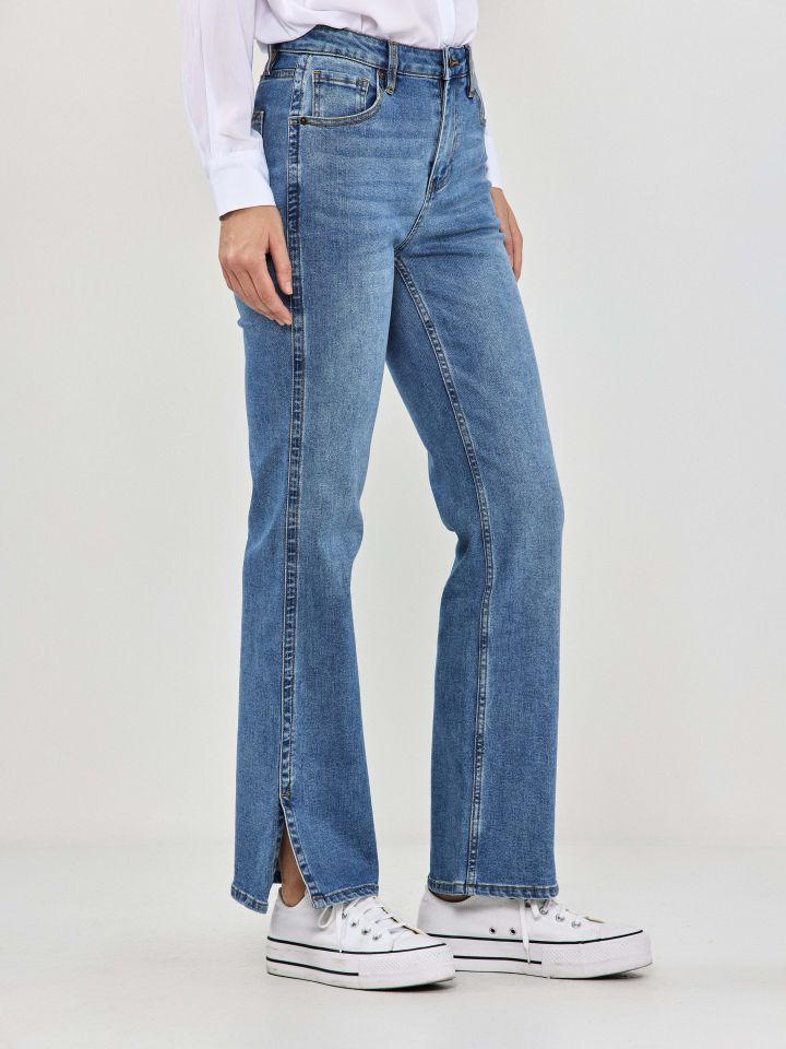 מכנסיים ג’ינס שליץ צד PROMO בצבע ג’ינס בהיר