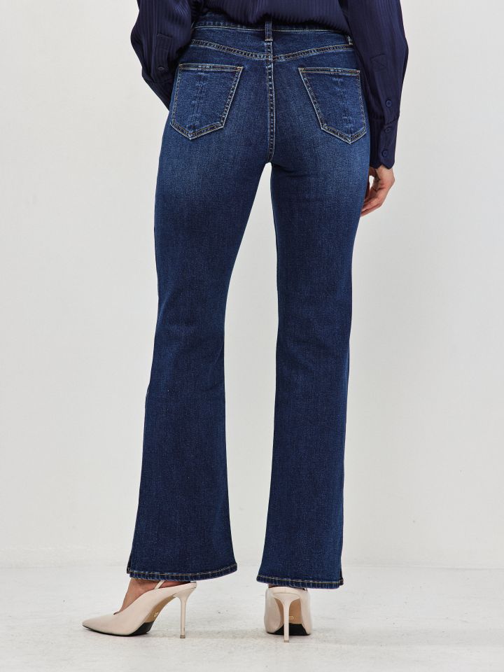 מכנסיים ג’ינס שליץ צד PROMO בצבע ג’ינס כהה