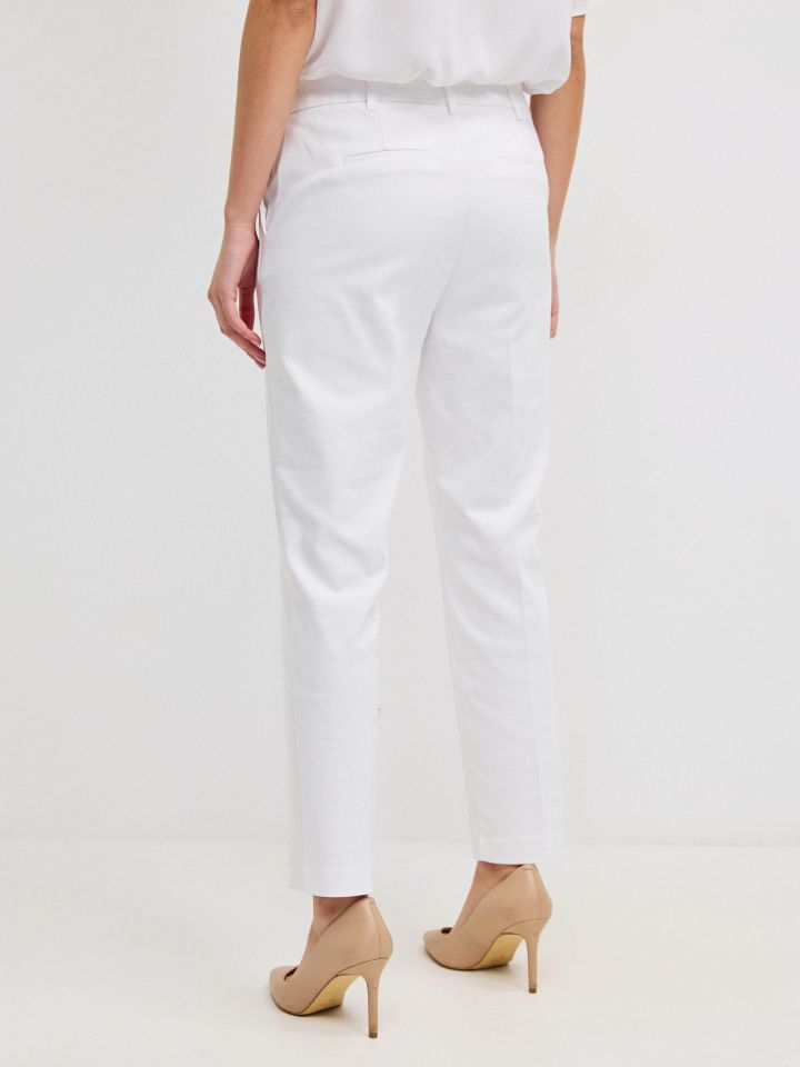 מכנסיים 7/8 אבזמים בצבע לבן