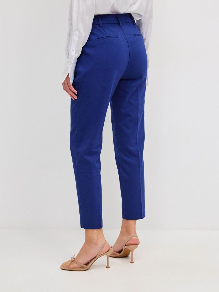 מכנסיים 7/8 אבזמים בצבע נייבי