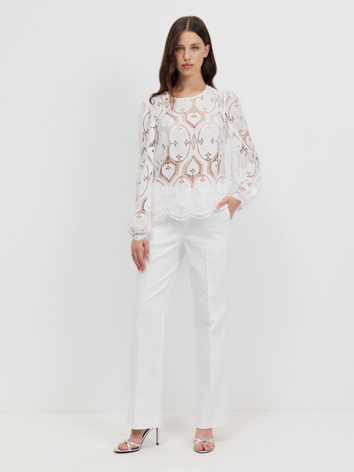 מכנסיים נירבירים בצבע לבן