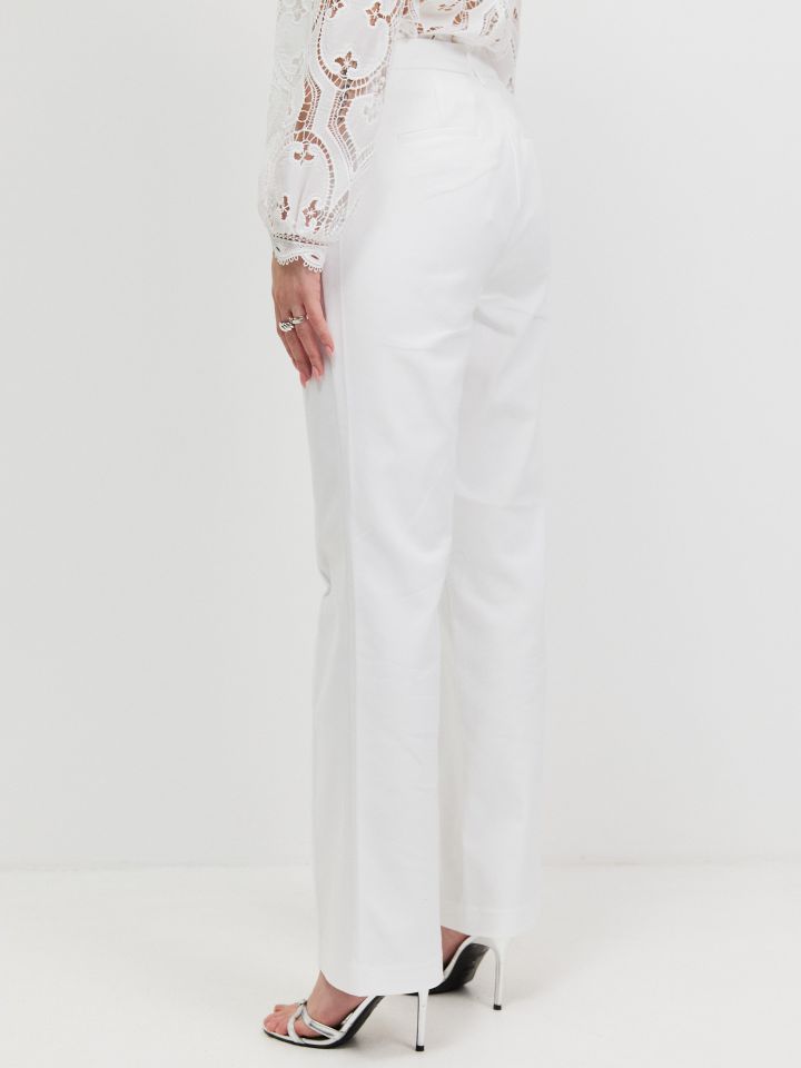 מכנסיים נירבירים בצבע לבן