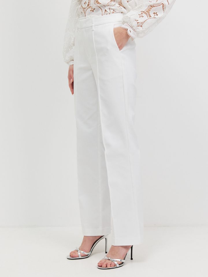 מכנסיים נירבירים בצבע לבן