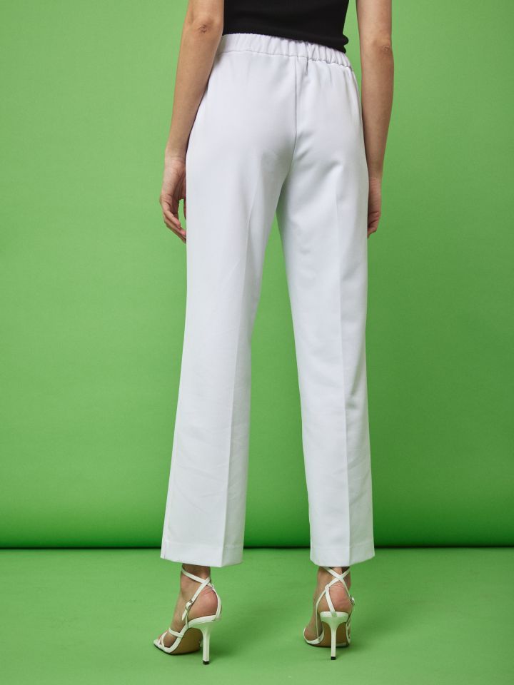 מכנסי גומי בגב + כפתורים בצבע לבן