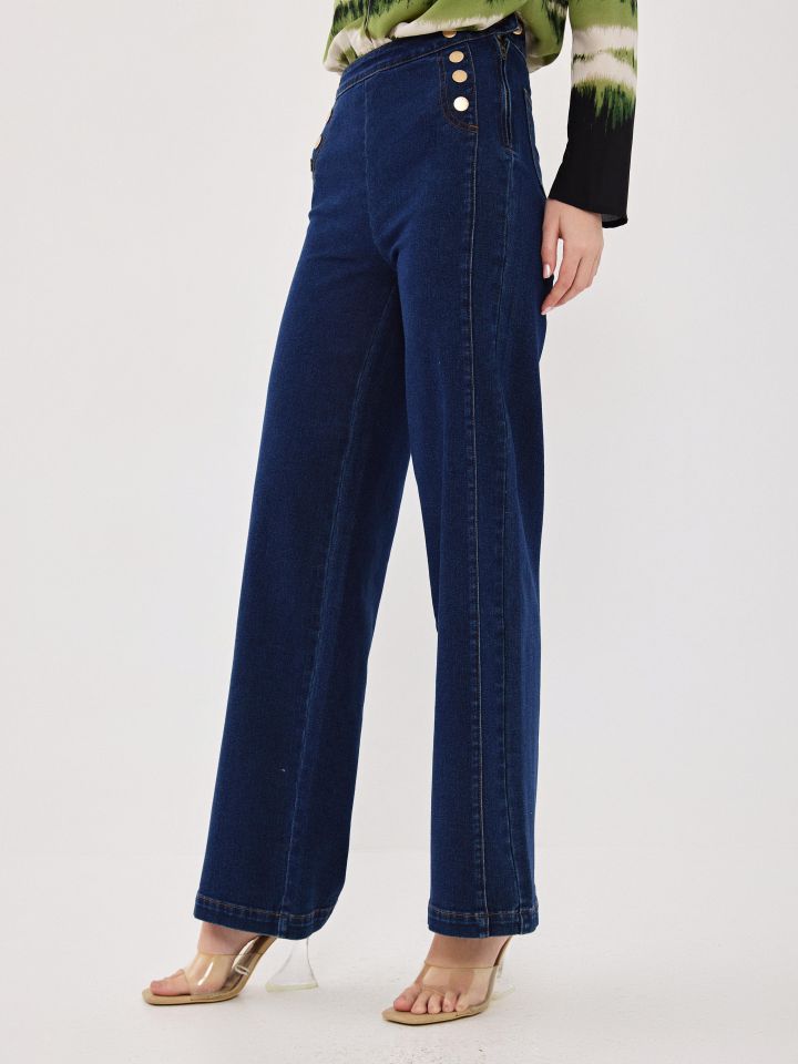 מכנסיים ג’ינס כפתורים בצדדים בצבע ג’ינס כהה