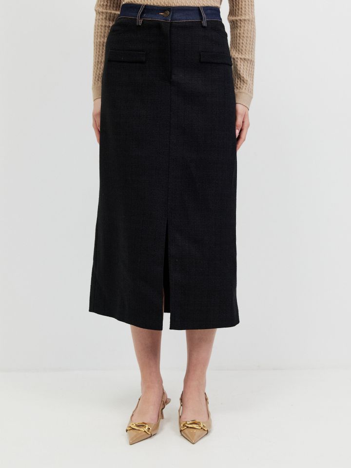 חצאית בוקלה מראה חגורה גינס בצבע שחור