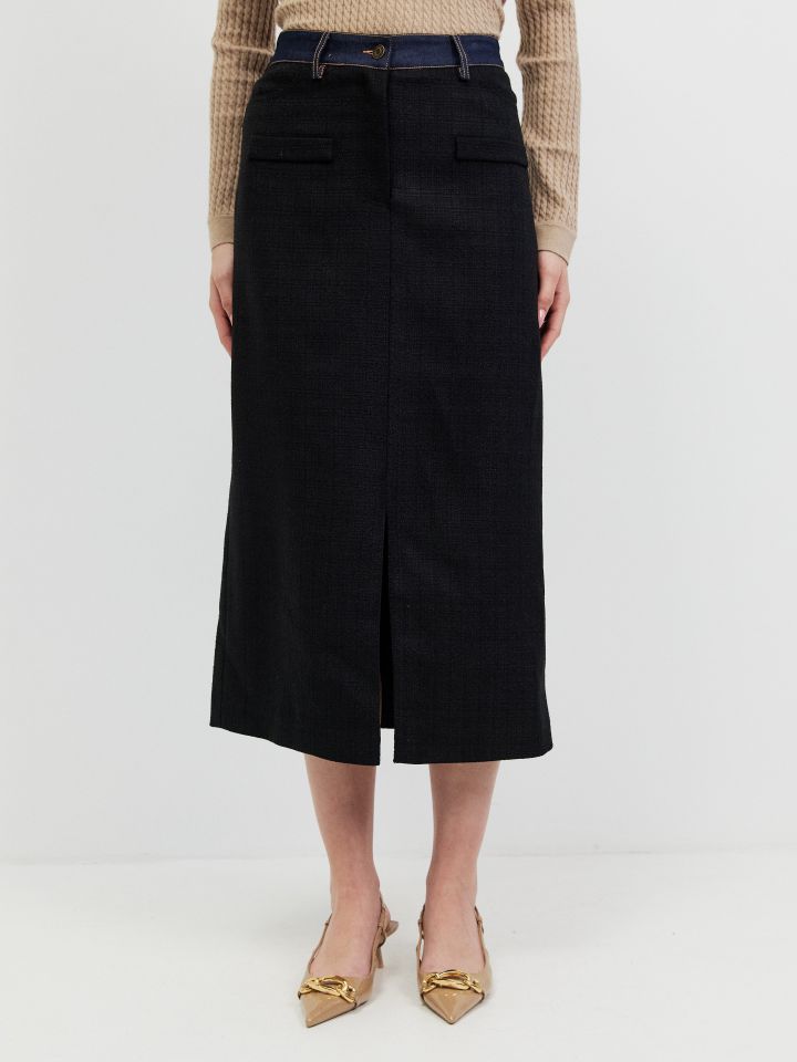 חצאית בוקלה מראה חגורה גינס בצבע שחור