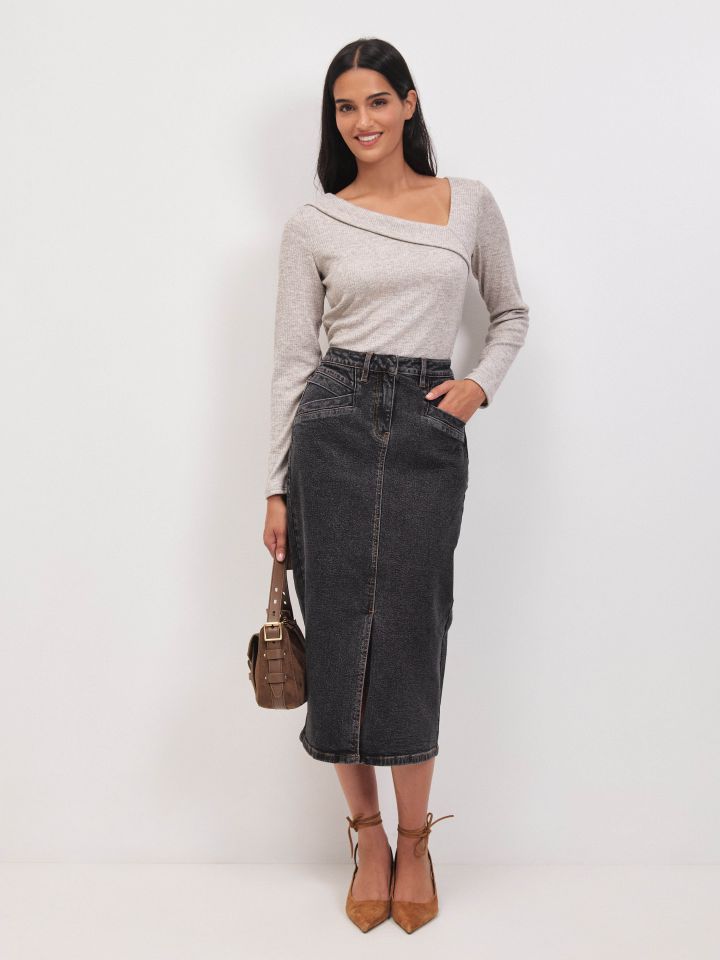 חצאית ג’ינס כיסים בצבע ג’ינס שחור