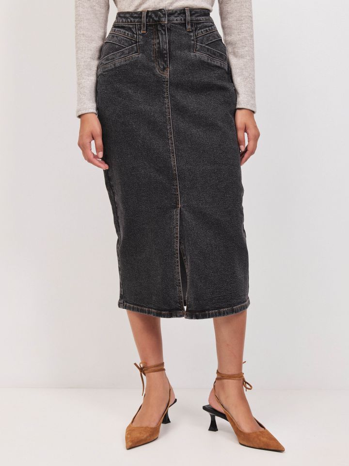 חצאית ג’ינס כיסים בצבע ג’ינס שחור