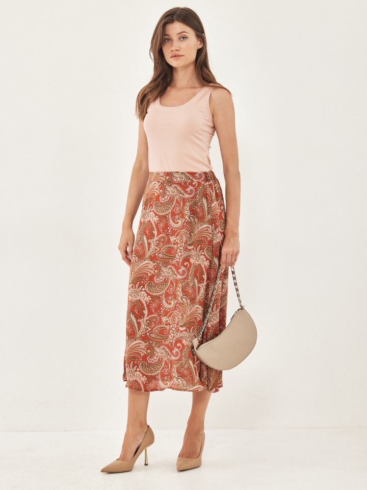 חצאית דפוס גומי בגב בצבע בריק