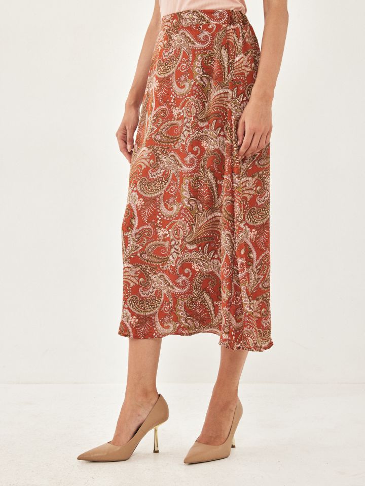 חצאית דפוס גומי בגב בצבע בריק