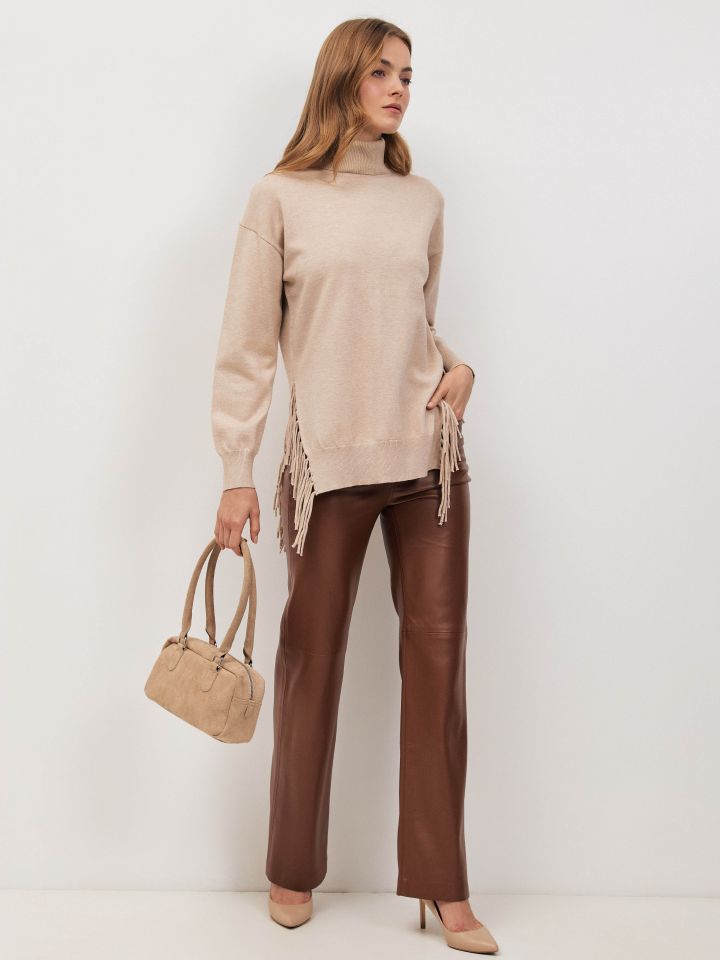 סריג גולף פרנזים בצבע בייז מלנג’