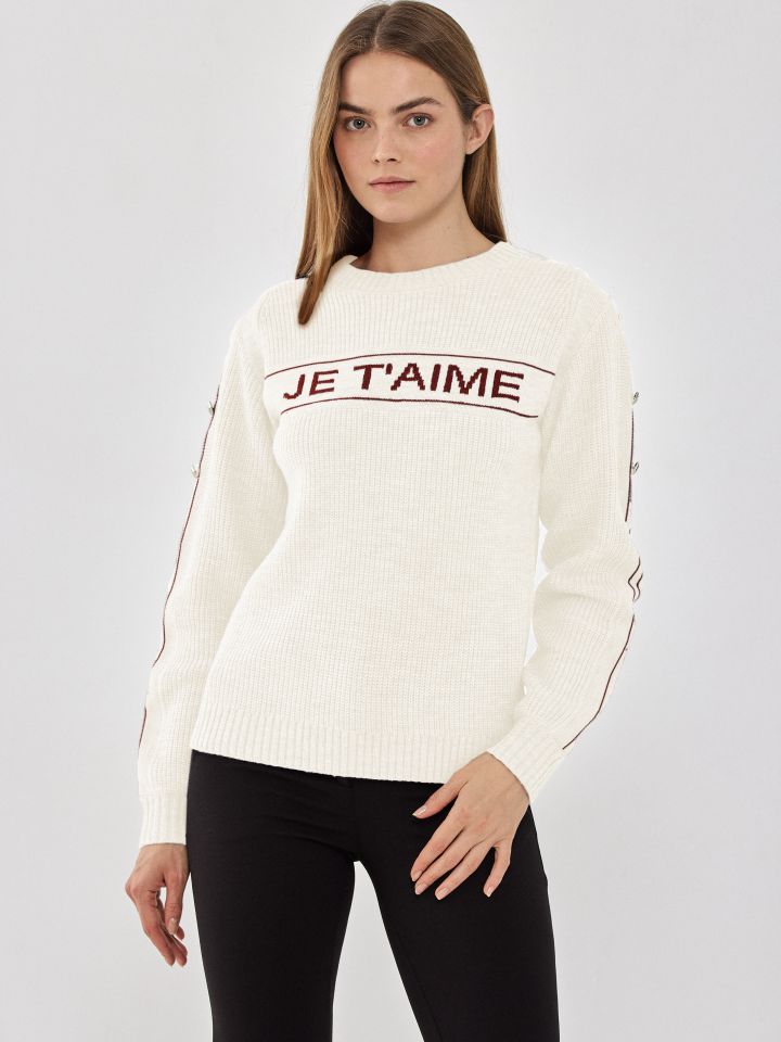 סריג פסים שילוב ניטים בשרוול בצבע אופוויט