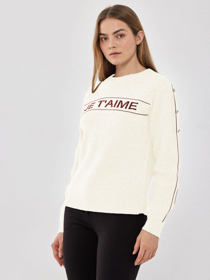 סריג פסים שילוב ניטים בשרוול בצבע אופוויט