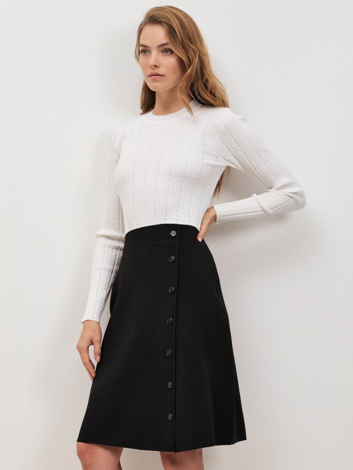 שמלה סריג שילוב בצבע שחור/אופוויט