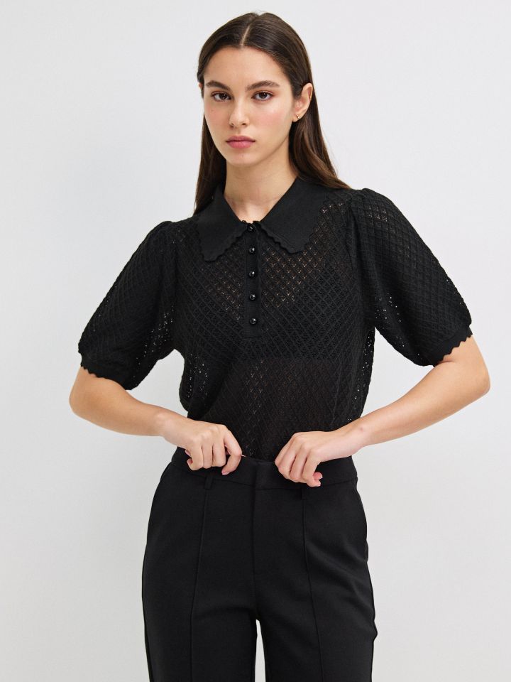 סריג רשת כפתורים בצבע שחור