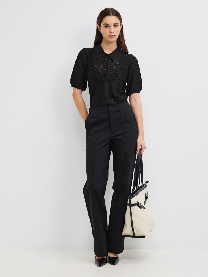 סריג רשת כפתורים בצבע שחור