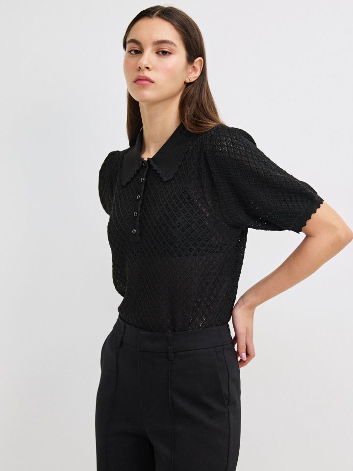 סריג רשת כפתורים בצבע שחור