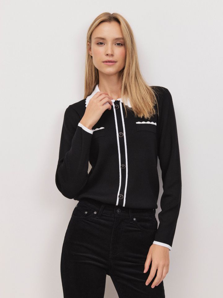 סריג צוארון כיסים שילובים בצבע שחור