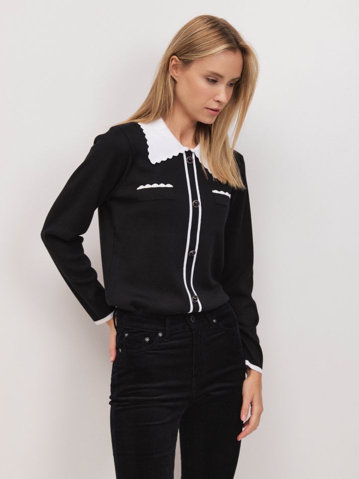 סריג צוארון כיסים שילובים בצבע שחור