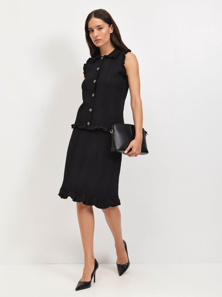 וסט סריג כפתורים SHIRAN בצבע שחור