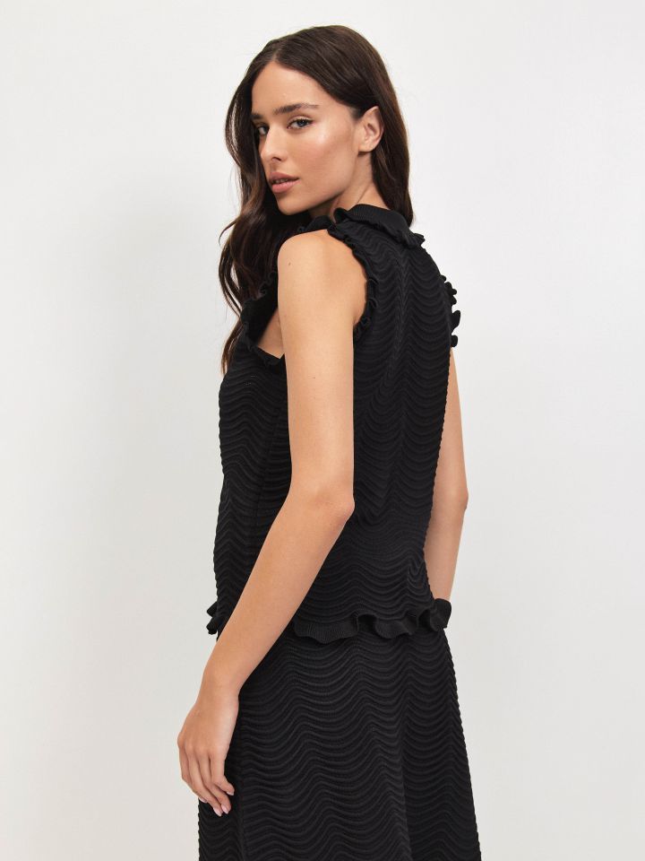 וסט סריג כפתורים SHIRAN בצבע שחור