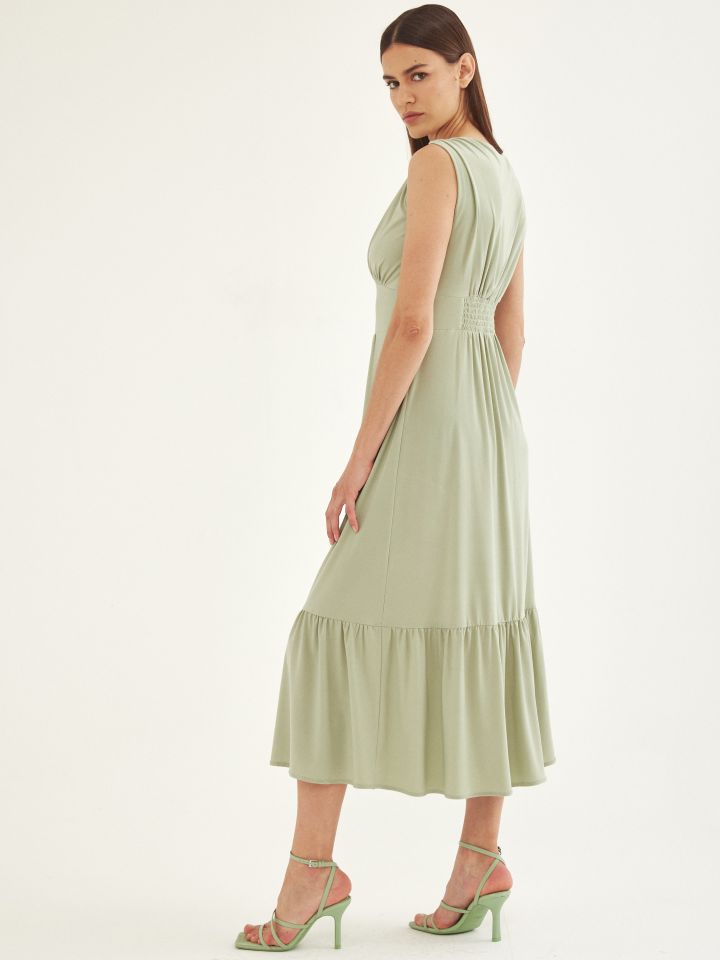 שמלה V כיווצים וכפתורים בצבע ירוק בהיר