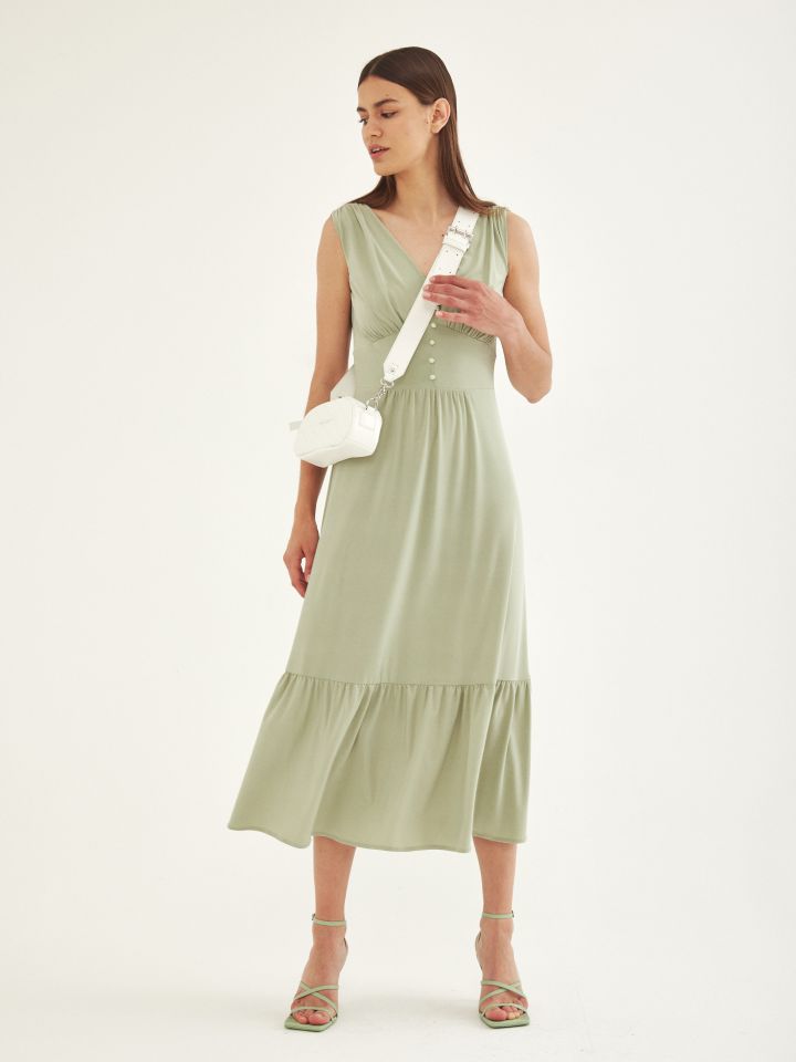 שמלה V כיווצים וכפתורים בצבע ירוק בהיר