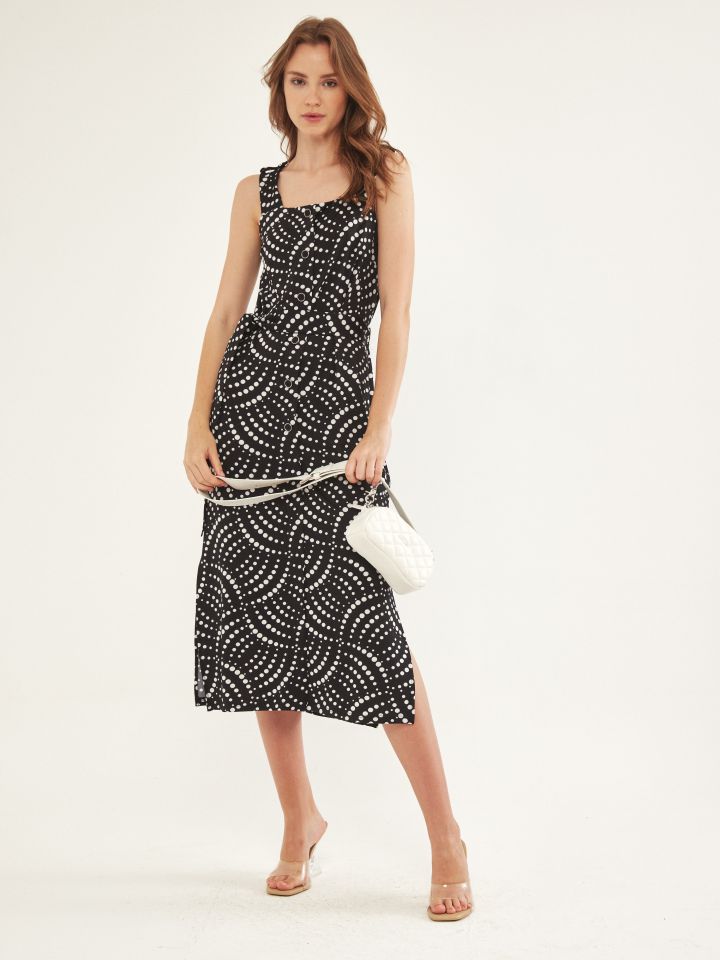 שמלה כפתורים + חגורה נקודות בצבע שחור