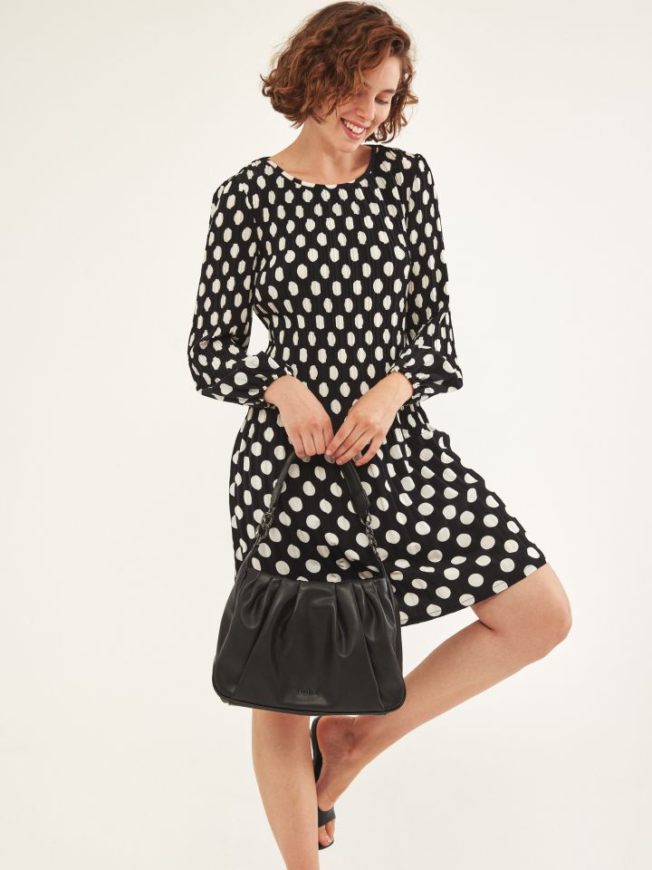 שמלה פליסה נקודות בצבע שחור/לבן