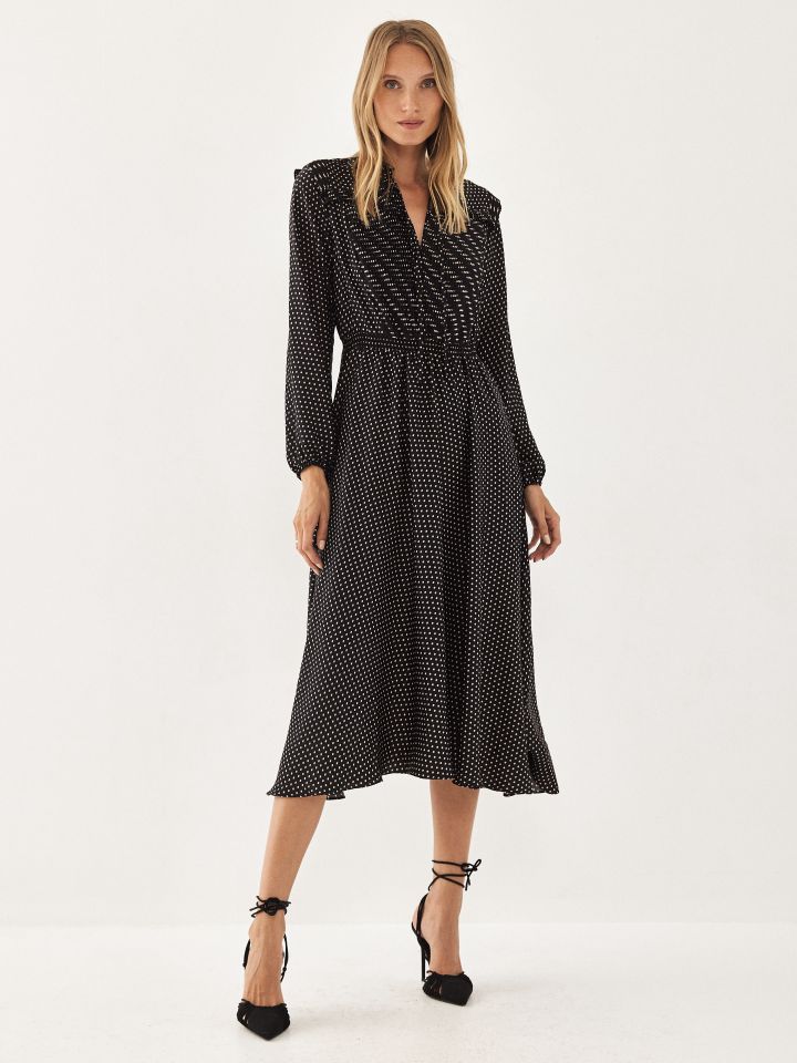 שמלה נקודות בצבע שחור